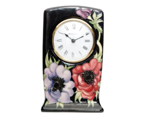 A Moorcroft Pottery mantel clock decorated in the Anemone Tribute pattern, designed by Emma Bossons, impressed and printed ma