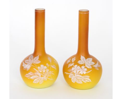 A pair of late 19th Century Continental pseudo cameo glass vases, possibly Harrach, of globe and shaft form hand enamelled in