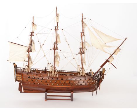A late 20th Century scratch built model of a three masted Napoleonic battleship height 61cm x width 69cm