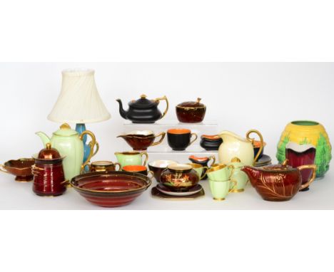 An assorted collection of Carlton Ware lustre wares to include Rouge and Bleu Royale teapots, lamp base, vases, part teasets 