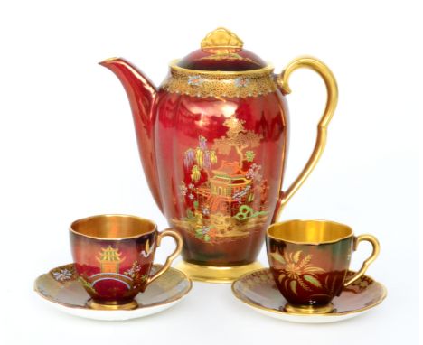 A 1930s Carlton Ware New Mikado pattern coffee pot and matching cup and saucer together with a similar 1930s coffee cup and s