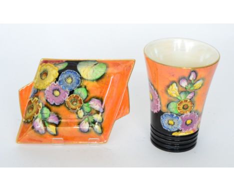 A 1930s Carlton Ware Art Deco vase of flared form decorated in the Hollyhocks pattern with enamel flowers to an orange lustre