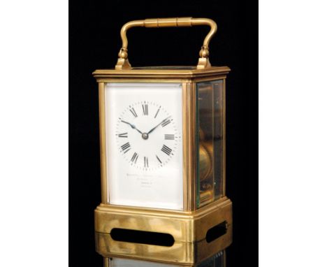 A late 19th to early 20th Century gilt and bevelled glazed cased striking carriage clock, with French movement stamped L.F. P