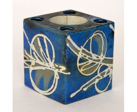 A Royal Copenhagen Fajance cube candlestick, each facia decorated in a white slip glaze over a pale blue and olive green grou