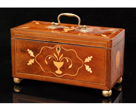 A 19th Century inlaid mahogany tea caddy decorated with primitive flowers centred with vases on brass ball feet, width 25.5cm