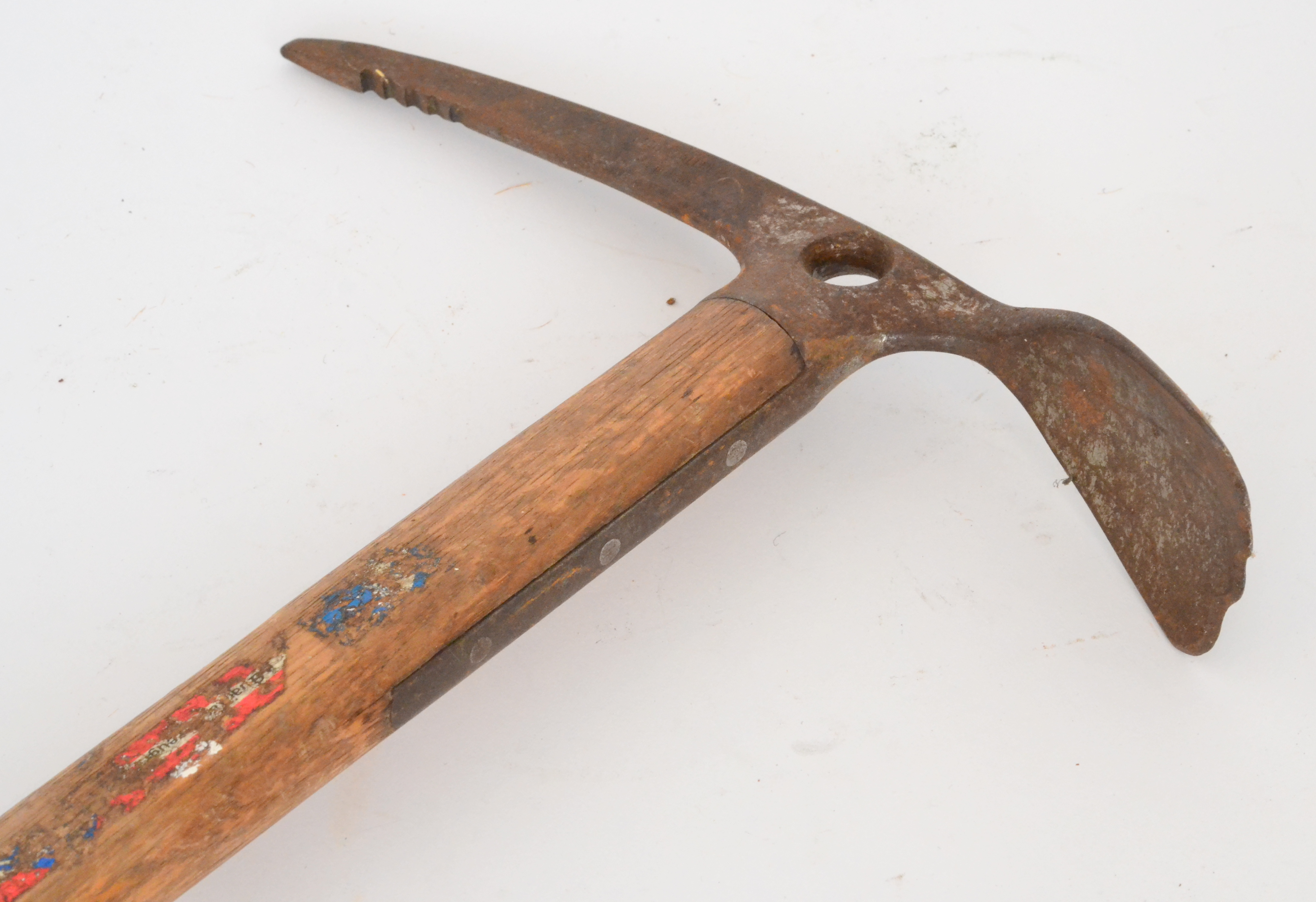 An ice axe with ash shaft, circa 1960, length 79cm