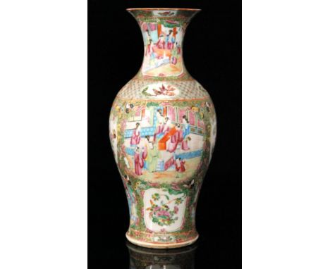 A large late 19th to early 20th Century Canton enamel famille rose baluster vase decorated with cartouche panels of women in 