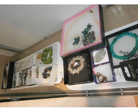 shelf of costume jewelry