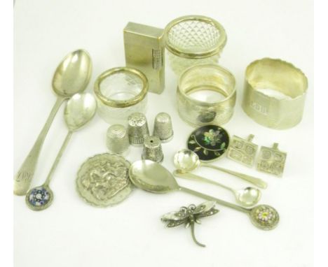 A DUNHILL SILVER PLATED CIGARETTE LIGHTER, TWO SILVER NAPKIN RINGS, TWO SILVER MOUNTED CUT GLASS SALT CELLARS, ETC