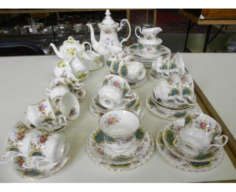 A SHELLEY PRIMROSE PATTERN TEA SERVICE FOR TWO, A ROYAL ALBERT BERKELEY PATTERN TEA AND COFFEE SERVICE AND A COFFEE POT AND C