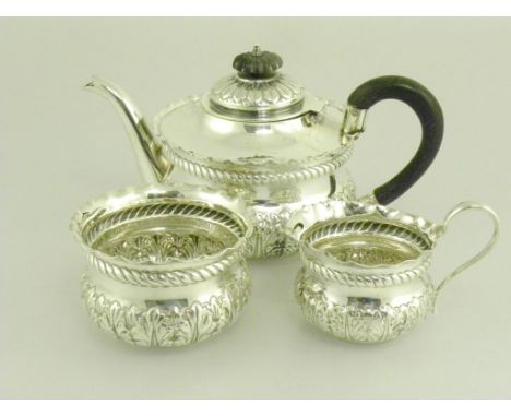 A VICTORIAN SILVER BACHELOR'S TEA SERVICE, FOLIATE EMBOSSED, LONDON 1898, 11OZS GROSS