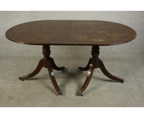 A George III style mahogany D end dining table, with an additional leaf, on turned supports with tripod legs. H.75 W.211 D.10