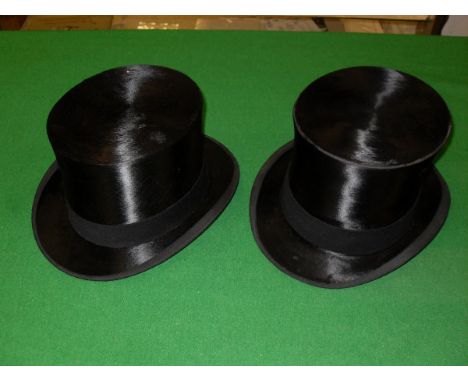 A Patey of London black silk Top Hat approx 7 1/4 together with a Christies of London black silk Top Hat approx 6 3/4 CONDITI