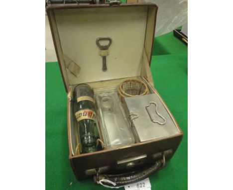 A leather cased drinks and sandwich hamper containing flask, glass, vintage bottles and sandwich box