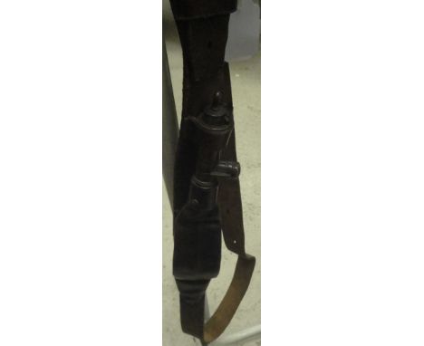A late Victorian Dixon & Sons patent leather and brass mounted shot flask belt fitted