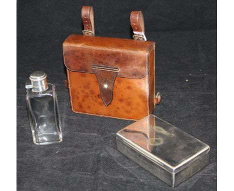 A George Parker & Son leather lunch box containing a plated Swaine & Adeney sandwich box and glass flask