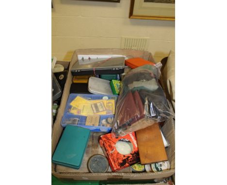 A large collection of miscellaneous fishing tackle to include fly cases and wallets, fishing reels, rod handles, fly tying eq