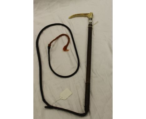 A Swaine & Adeney gentleman's riding crop with silver collar stamped "SWAINE" (marks rubbed), the antler handle bearing butto