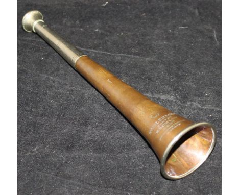 A late 19th Century copper and plated Köhler & Son hunting horn CONDITION REPORTS The hunting horn has several large dents al