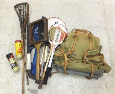 Various tennis and badminton racquets together with a lacrosse stick and hockey stick and a rucksack CONDITION REPORTS All it