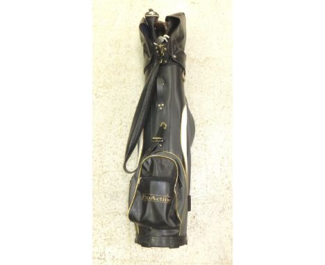 A golf bag and contents of various golf clubs to include examples by Dunlop