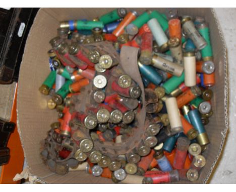 A box of various loose 12 gauge cartridges including Holland and Holland 6-shot, Eley Kinnock pneumatic Edinburgh, Winchester