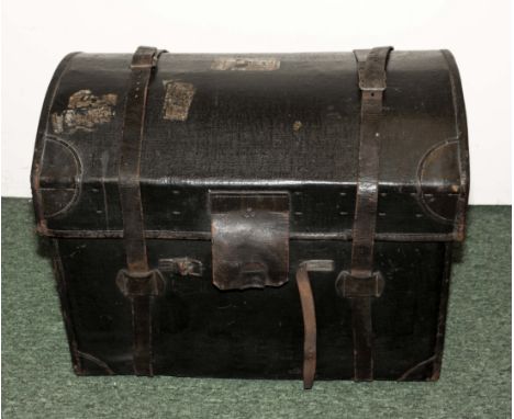 A heavy leather trunk.