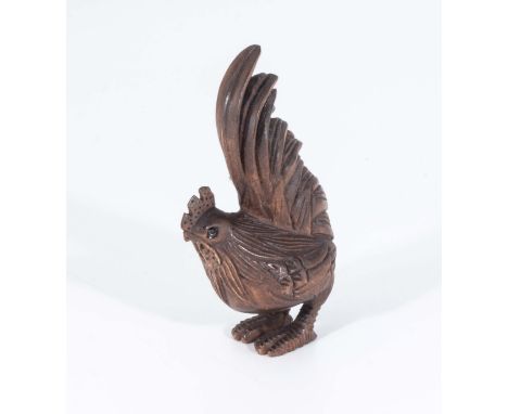 A hand carved wooden netsuke of a cockerel