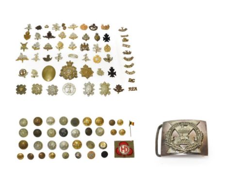 A Collection of Approximately Eighty British Badges, including cap and collar badges, glengarry badges, shoulder titles, helm