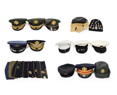 A Quantity of US Military Headgear, including a USAF Field-Grade Service cap, US Army Senior Officer's blue cap with Finance 