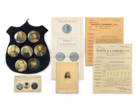 A Blue Velvet Shop Display Shield, set with seven large celluloid photographic button badges depicting Queen Victoria and her