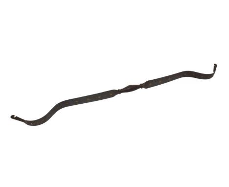 An Indian Steel Bow, in two sections screwing together at the grip, with gold koftgari decoration of rosettes on a blued fiel