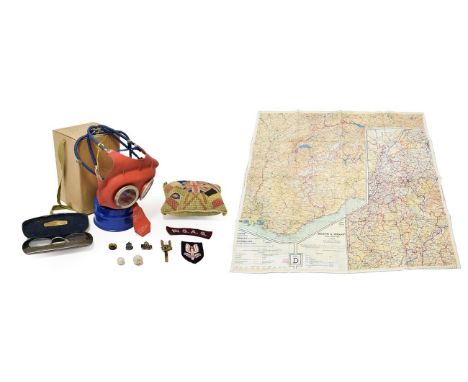 A Small Quantity of Militaria, comprising a Second World War Mickey Mouse respirator for a small child, in original cardboard