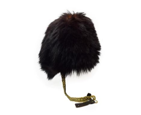 A British Guards Regiments Other Ranks Bearskin Cap, of black synthetic fur, with wicker frame, leather sweatband and brass c