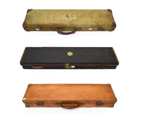 A Later 20th Century Leather Shotgun Case, bound with brass, with wood carcass, the maroon baize lined interior fitted to tak