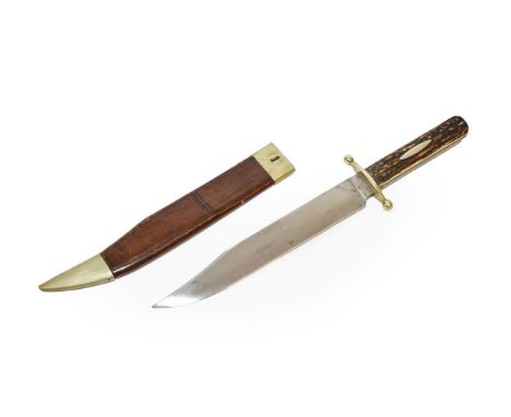 A Victorian Bowie Knife by Wostenholme, Sheffield, the 24.5cm clip-point steel blade with maker's mark +* to one side of the 