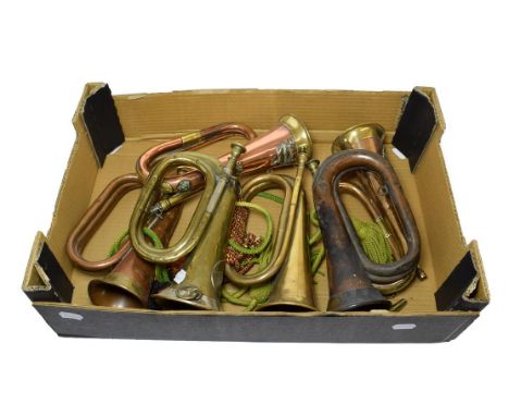 An Imperial German Military Brass Bugle, set with a brass Imperial Eagle badge, stamped ''C. W. Moritz, Berlin''; a First Wor