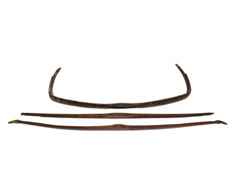 A Late 18th /Early 19th Century Indian Composite Bow, of wood covered in sinew and bearing traces of original red, black and 