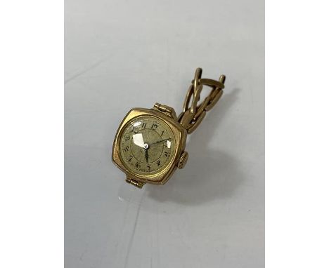 A first half of 20thc ladies' wrist watch marked .375 gold to case and strap marked 9ct, (dial 2cm x 2cm) weighs 17.25 gramme
