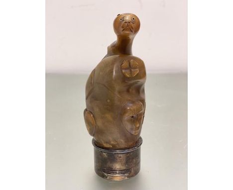 An unusual carved animal horn animal mask heart diamond Masonic symbol and shell carved flask with stirling silver base with 