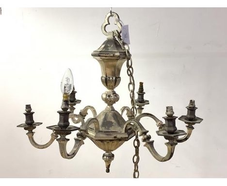An early 20th century silvered metal Dutch style chandelier, the central section of faceted octagonal form issuing six branch