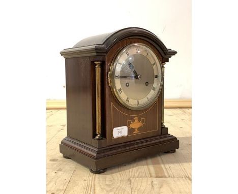 An Edwardian inlaid mahogany cased bracket clock, silvered dial with Roman chapter ring, eight day movement stamped Junghans,
