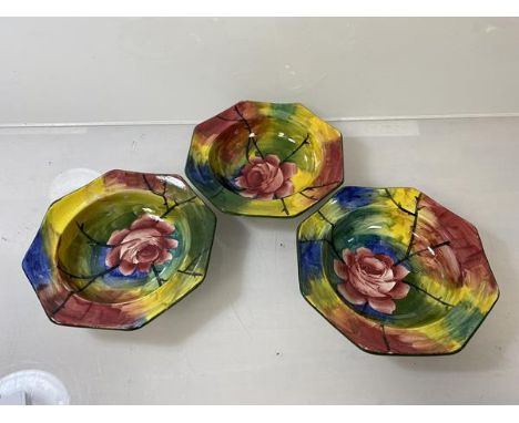 A set of three Wemyss bowls of octagonal form with stylised abstract design and cabbage rose, each marked Wemyss 213 to base,