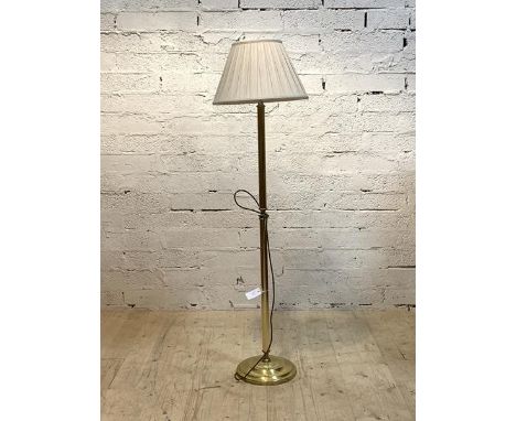 A late 20th century brass lamp standard, with fluted stem and circular base, H145cm