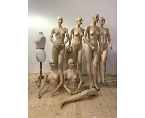A set of six painted injection moulded polyurethane  female shop display mannequins, on circular chrome bases (Lacking two ba