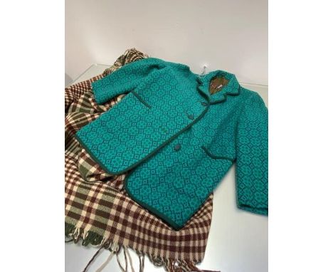 A tartan reverse check pattern vintage wool lap throw with green and peach coloured check to one side and burgundy and green 