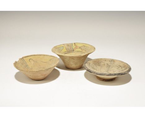 3300-1700 BC. A mixed group comprising: a funicular bowl with polychrome lion and ibex; a funicular bowl with flared rim, pol