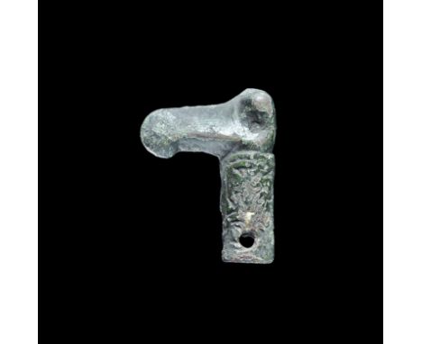12th-13th century AD. A slightly tapered tubular socket with dense foliage detail and piercing, finial in the form of a bird'