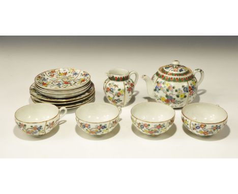 19th century AD. A fine porcelain tea-set with enamelled designs of birds on a twig with flowers comprising: four cups, four 