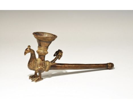 India, 19th-early 20th century AD. A tubular smoking pipe with bulb mouthpiece, the terminal a stylised peacock with flared t